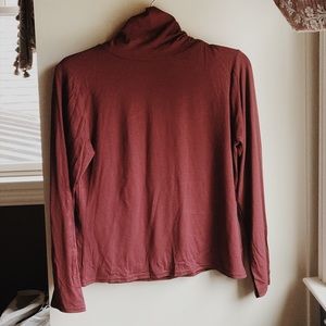Red turtle neck shirt